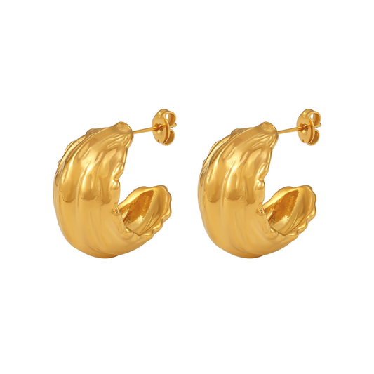 Pair of Muse Earrings on white background